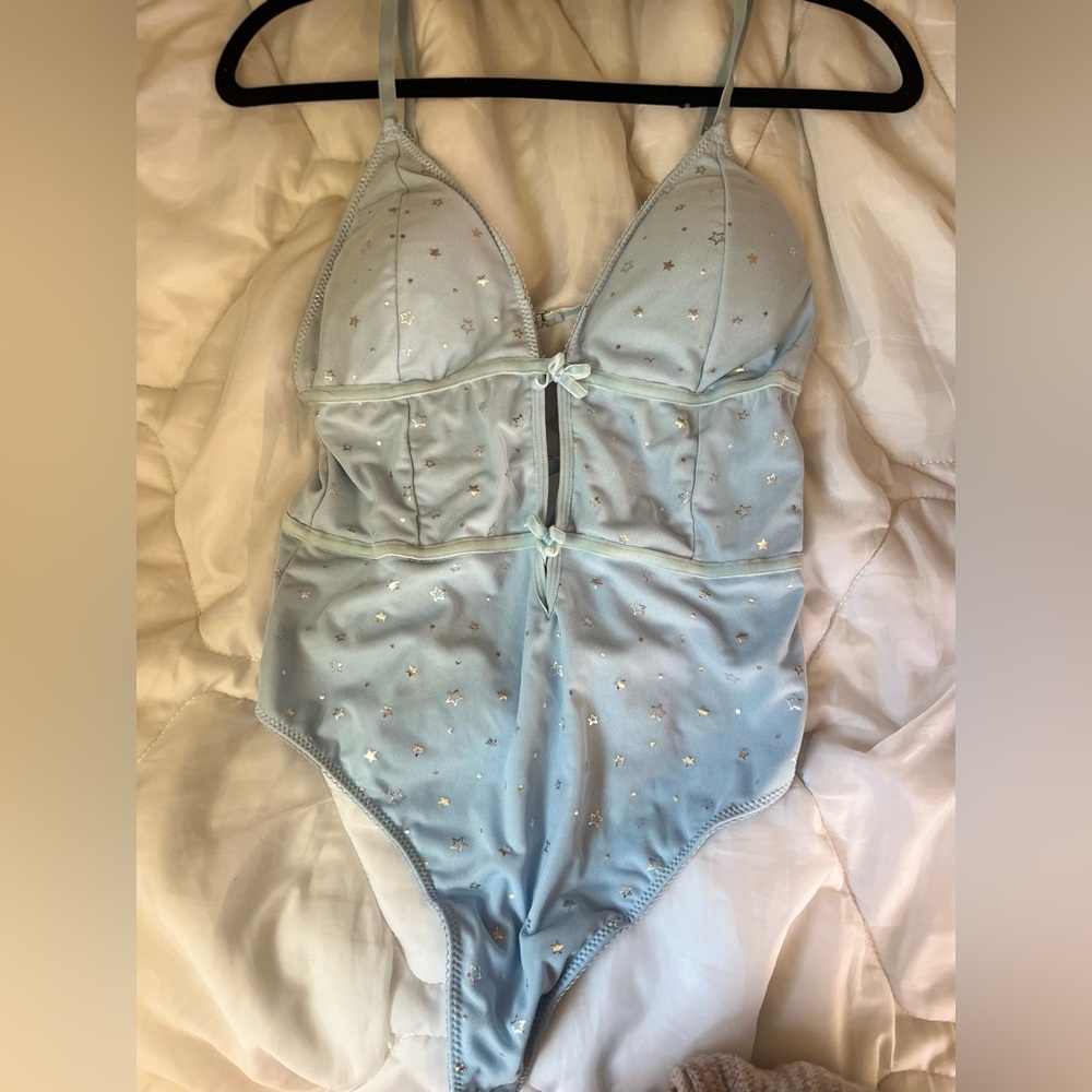 Blue body suit